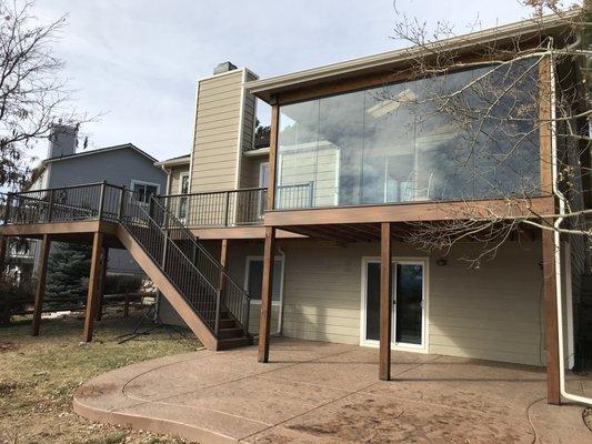 Deck with roof cover and full glass enclosure