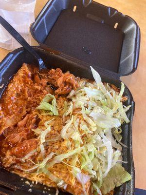 Enchiladas with just tortilla sauce and chicken with cheese and lettuce $9