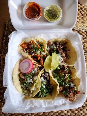 Tacos de barbacoa, suadero, carnitas, chicken and mole, and beef.