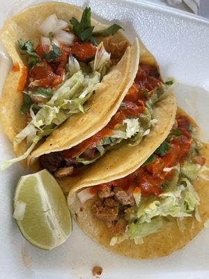 Chicken, beef, and pork tacos