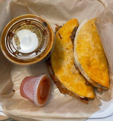 Regular sized Quesa Taco on the left, Street Quesa Taco on the right.