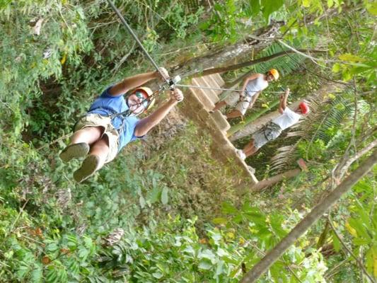 Andy Dickinson riding a Zip Line in Mexico