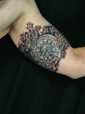 Black and grey pocket watch with hydrangeas