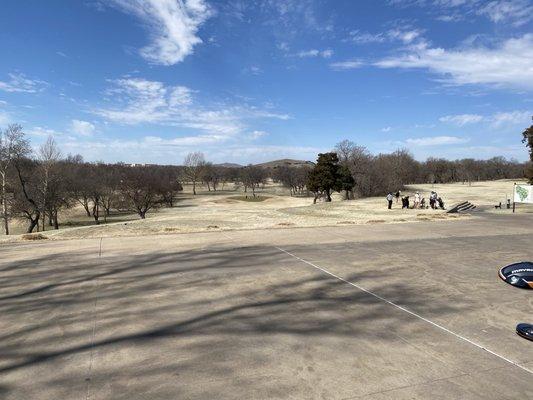 View from clubhouse to 1st tee on the right and green for #10