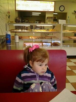 Inside enjoying a donut with my Carley