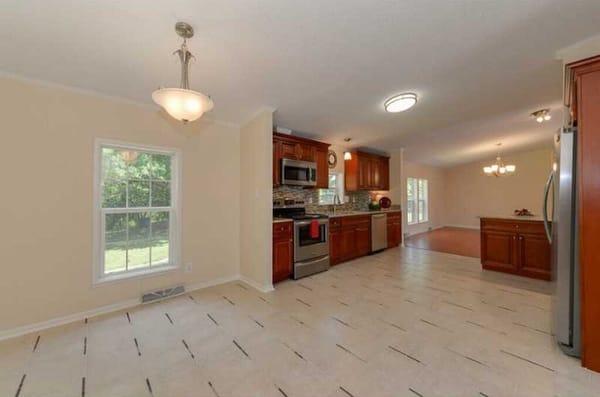 Cherry Cabinets and Desert Gold Granite by Global Home Decor.