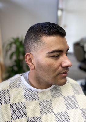 Mid skin taper fade.