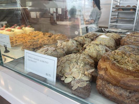 Twice-baked almond croissant in display case