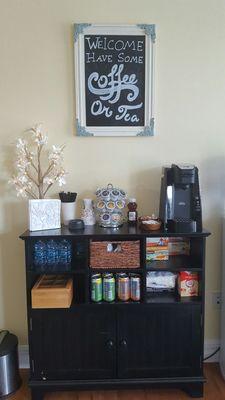 Nice cozy beverage station where you can have tea, coffee, regular spring bottled water, and sparkling water.