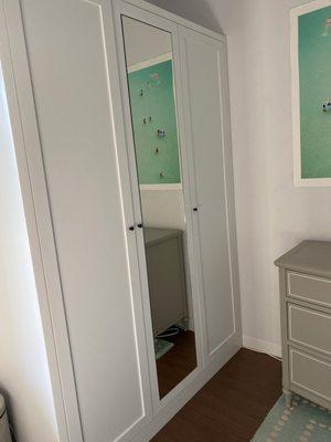 Custom Tall Mirror set into new closet.