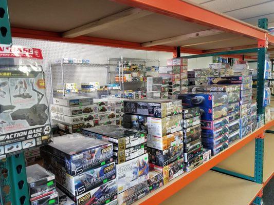 Stacks of plastic model kits.