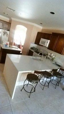 We installed cabinets doors raised panel.doors and drawers all soft close.installed quartz. Cloudy white. With waterfall