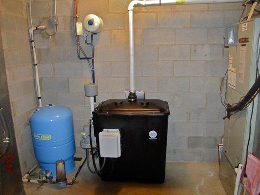 Aeration system for radon in well water.