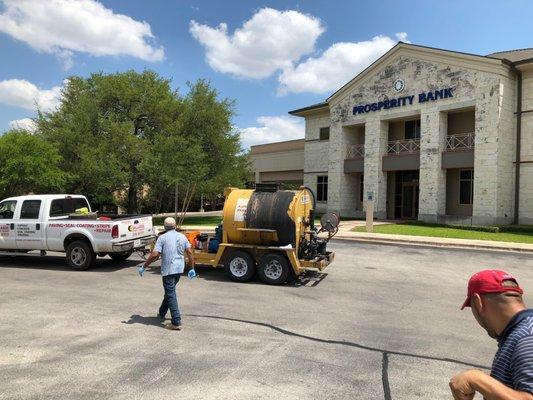 BEFORE: Prosperity Bank, Bee Cave TX - Asphalt Sealcoating, Parking Lot, Crack Fill