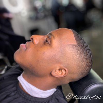 Bald fade with waves on top