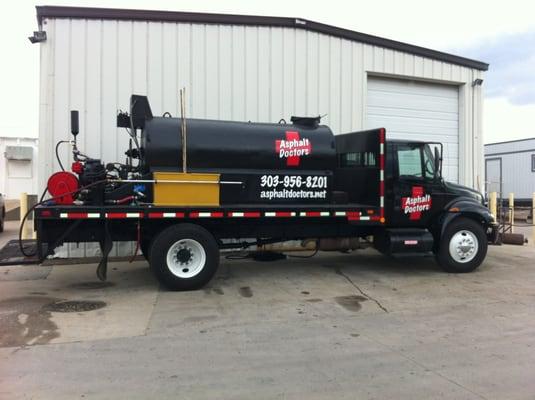 Sealcoat Tanker Truck in front of our shop