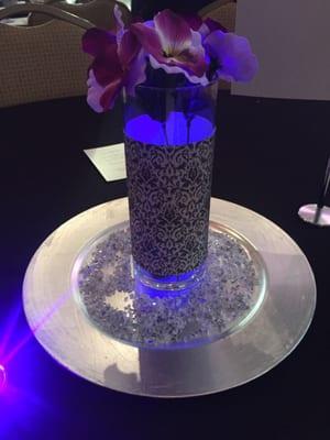 A beautiful arrangement of purple and pieces of a flower at this great event.