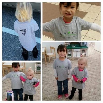 The girls in their new school shirts!  :)