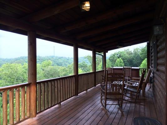 Relaxing back deck with rockers and a hot tub