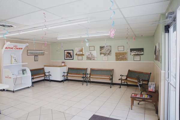 The clean, spacious waiting waiting room at the clinic includes a history of San Antonio throughout the room.