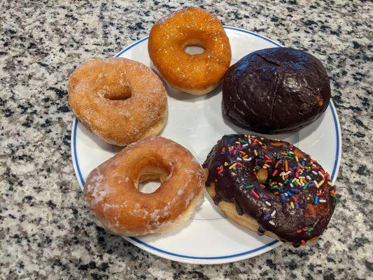 Taken at home, my assortment of donuts that were ordered to go.