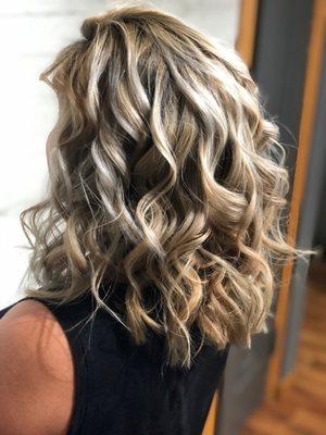 Beautiful highlights and lowlights along with a haircut makes for this stunning look.