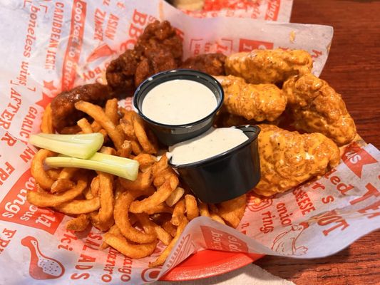 12 piece boneless wings with curly fries