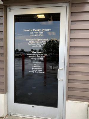 Front door entrance, with office information.