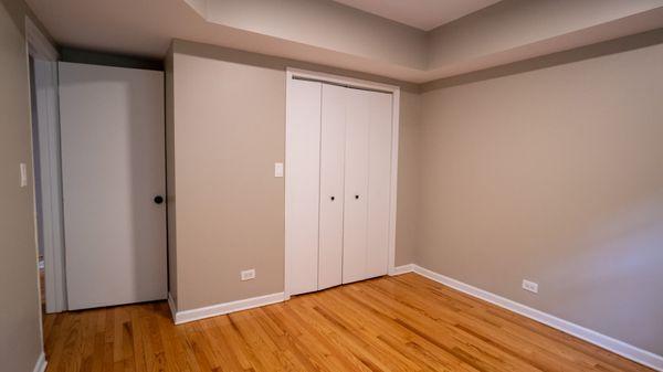 Bedroom with large closet doors