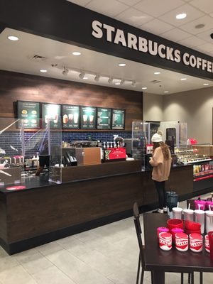 Starbucks counter in the store with extremely nice male barista. The woman was friendly too.