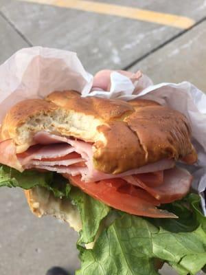 Ham and Swiss on a pretzel bun, fully loaded!