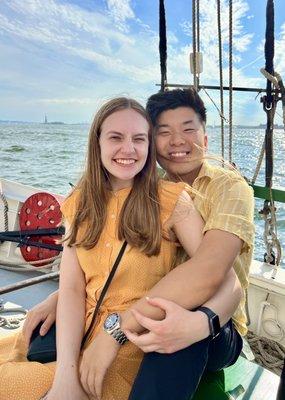 Happy couple enjoying the sea