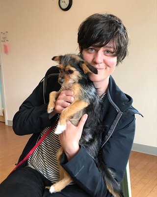 Massage Therapist Allison with a cute puppy