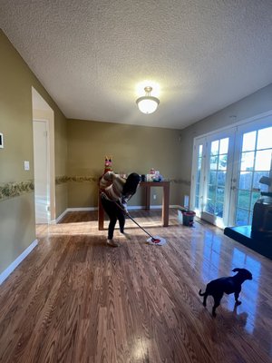 My daughter starting to clean the floors and baseboards herself since it was not completed by the cleaning company.