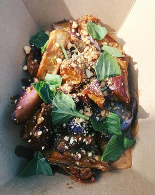 Japanese Eggplant: Tossed in our peanut sauce, topped with Thai basil. Yum!