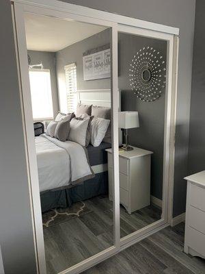 White wood trim closet doors