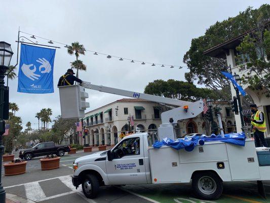 Flags on State Street created by ILRC