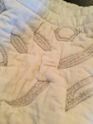 Ruined quilt, and they're denying it. Stay away from these crooks