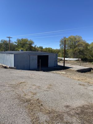 This metal building in Ojo Caliente plus 3 mobile home hook ups for $110,000.00