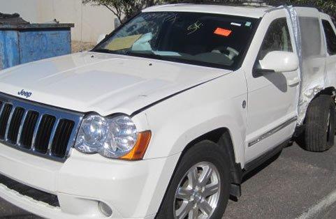 Jeep Grand Cherokee Right Side, Rear, and Front Damage Before