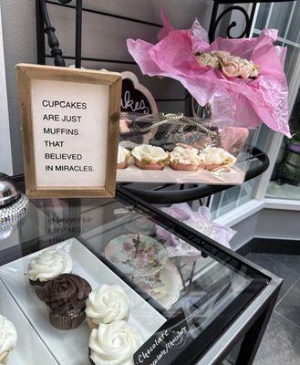 Cupcake display at the bakery.