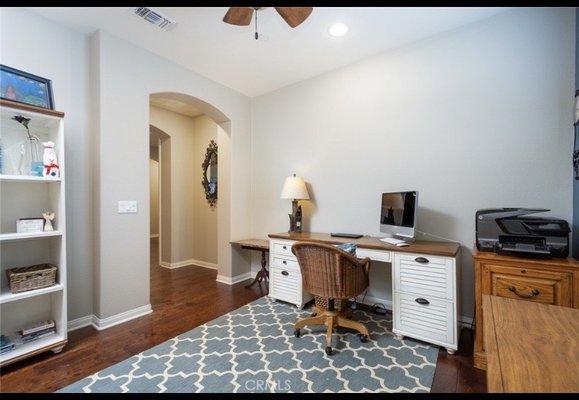 Office desk, chair, bookshelf, (lateral file cabinet not in pic).