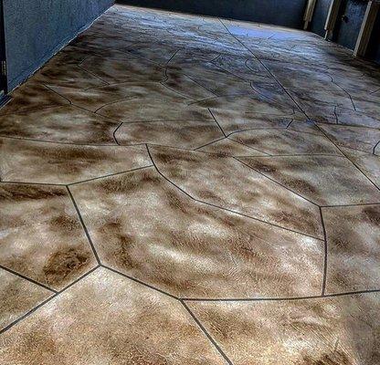 Decorative concrete textured overlay with stain & seal on existing concrete slab