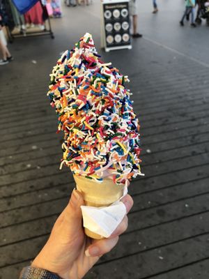 Vanilla & raspberry swirl with rainbow sprinkles