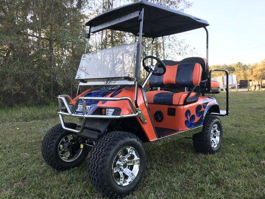 Refurbished w/ tribal orange & blue paint. Gator orange & blue seats!