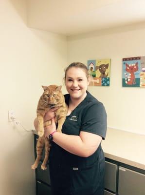 Kaylee (Kennel staff) and Carrots the clinic cat