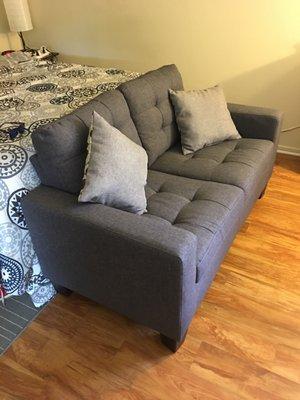 Grey loveseat for $180, $65 delivery three days later due to rain. All total about $261