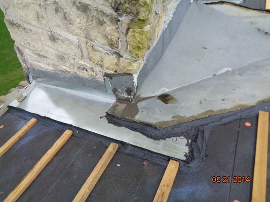 Install flashing and sealed with roofing plastic cement.