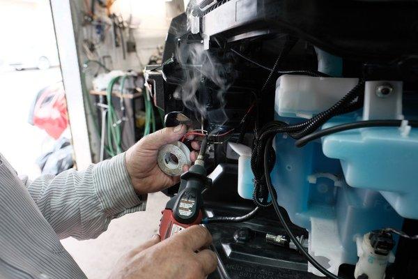 Darek even does electrical work. Here he is creating a connection for LED bezels from Japan to fit my US wrx