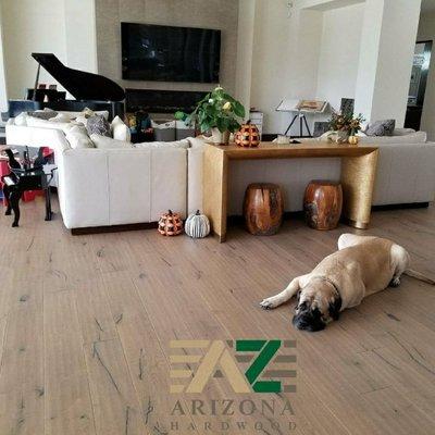 Dog enjoying rustic European white oak hardwood floor. We installed this in 2016.